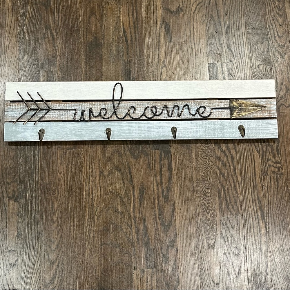 Wooden Welcome sign is new.